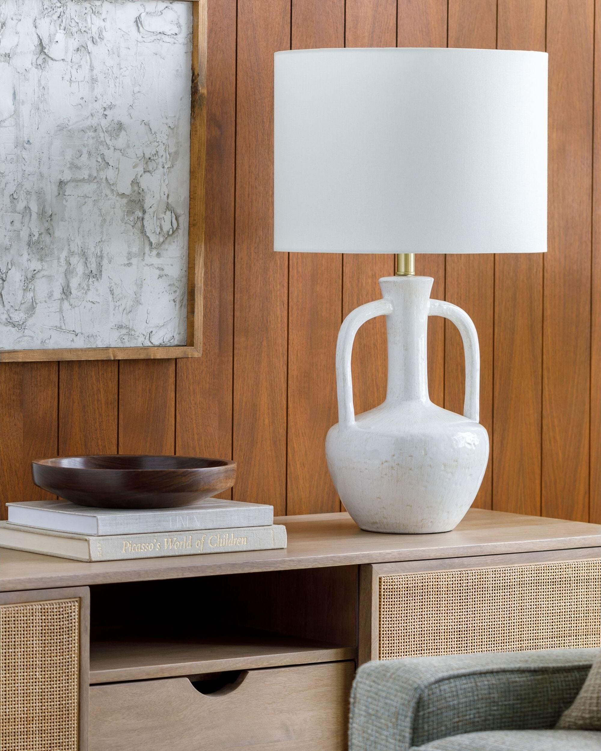 Shop chairs and discover refinishing services in the Denver area. MegMade designs has been featured in Architectural Digest for their patterned tudor home design style. Visit the MegMade store in the Winnetka - Chicago area.